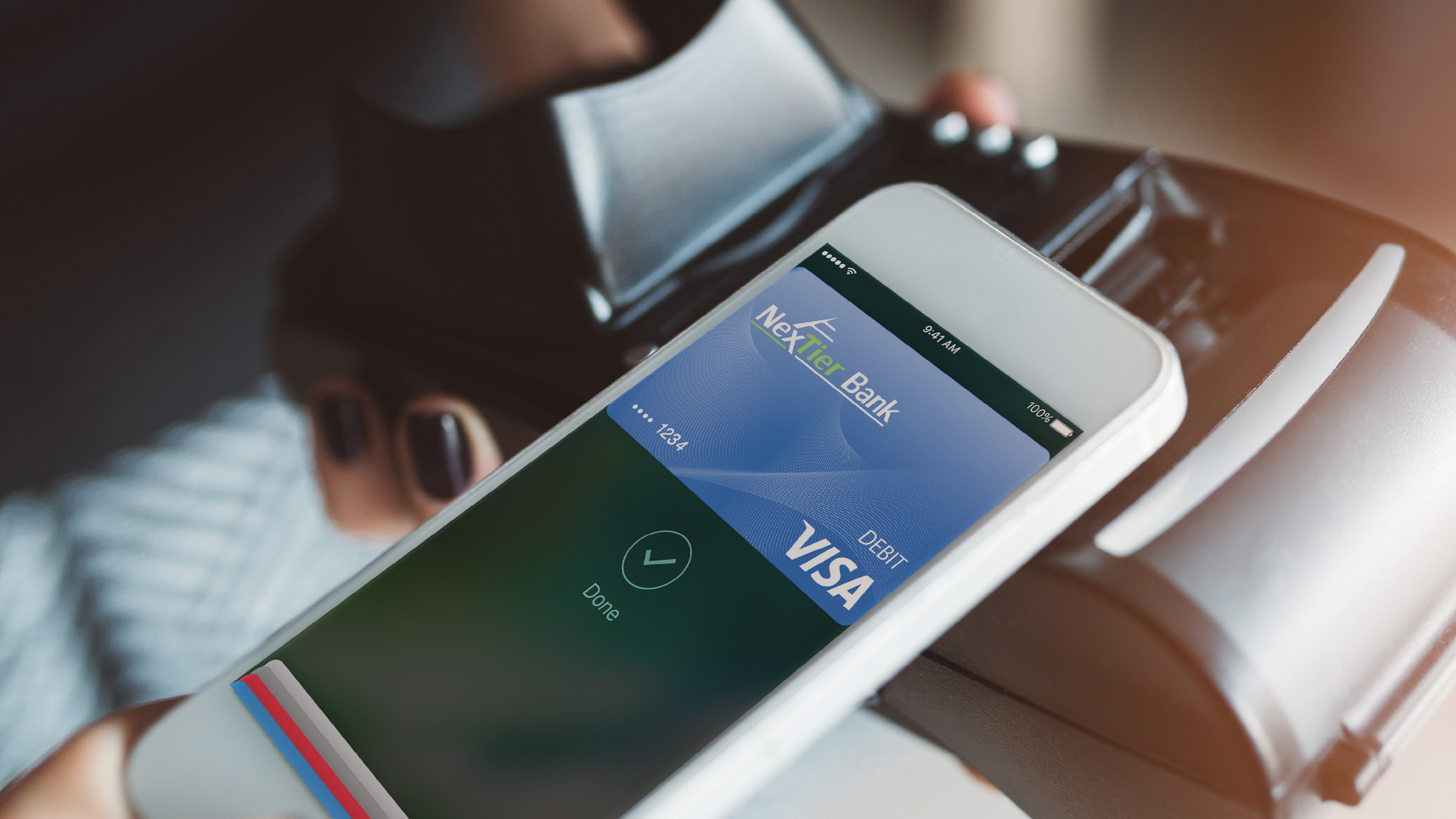 customer using mobile payments with a merchant card reader